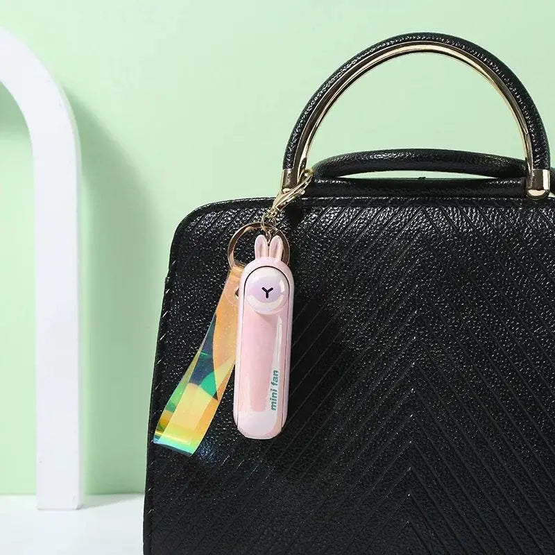 Cute Portable Mini Handheld Fan: Rechargeable Pocket Fan with Built-In Torch - Vox Megastore