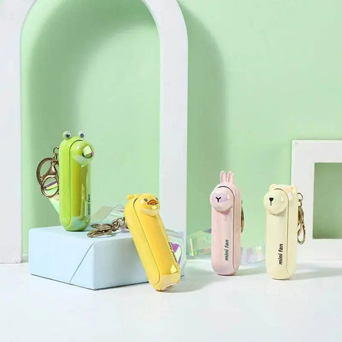 Cute Portable Mini Handheld Fan: Rechargeable Pocket Fan with Built-In Torch - Vox Megastore  