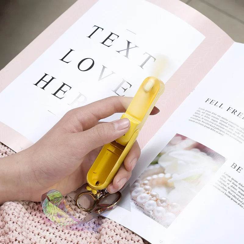 Cute Portable Mini Handheld Fan: Rechargeable Pocket Fan with Built-In Torch - Vox Megastore  