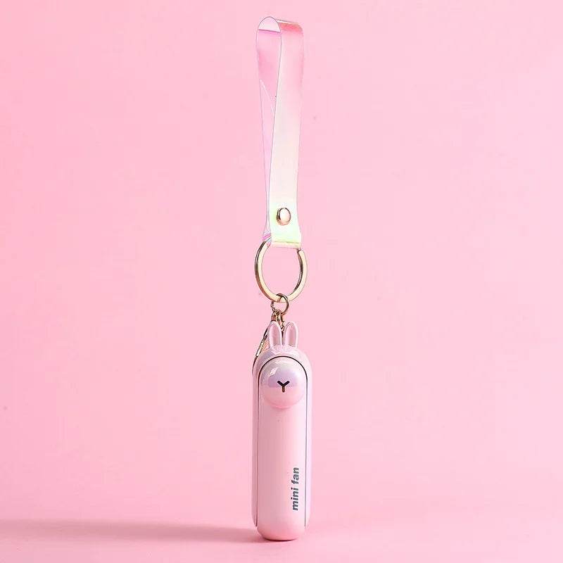 Cute Portable Mini Handheld Fan: Rechargeable Pocket Fan with Built-In Torch - Vox Megastore  