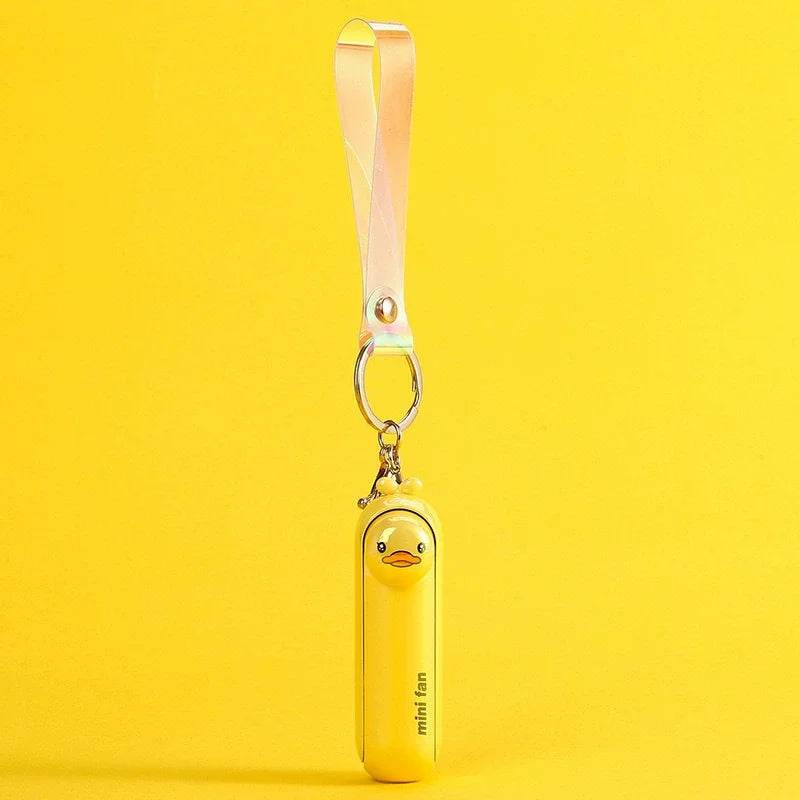 Cute Portable Mini Handheld Fan: Rechargeable Pocket Fan with Built-In Torch - Vox Megastore  