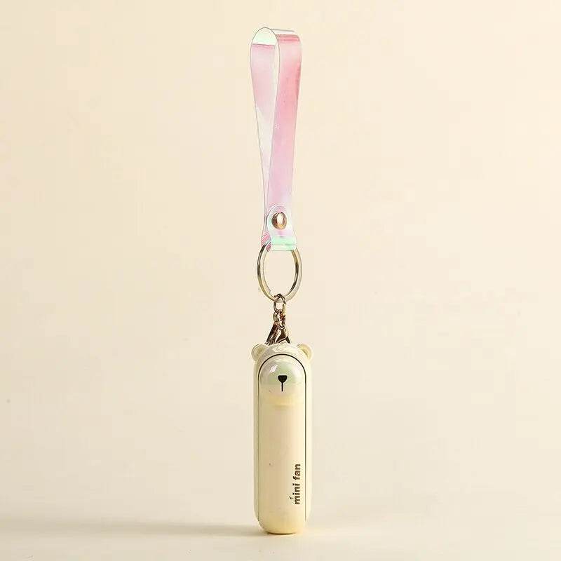 Cute Portable Mini Handheld Fan: Rechargeable Pocket Fan with Built-In Torch - Vox Megastore  