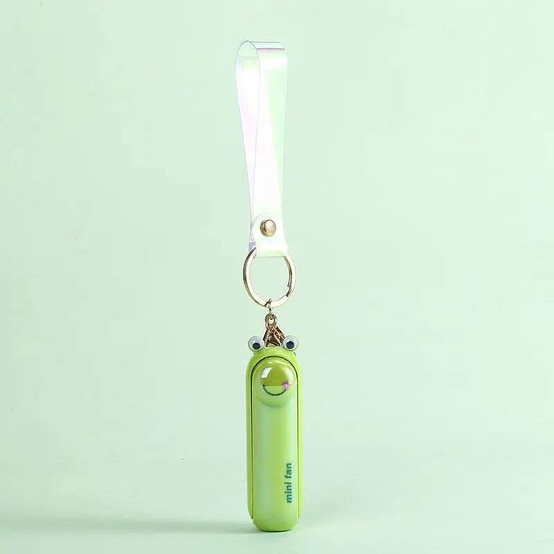 Cute Portable Mini Handheld Fan: Rechargeable Pocket Fan with Built-In Torch - Vox Megastore  